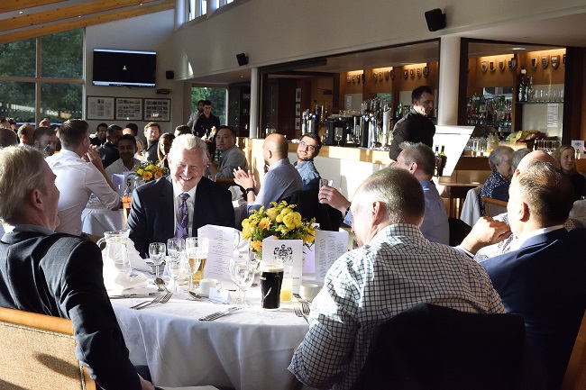 Photograph of the SCR table at the Class of 2002 reunion, May 2022