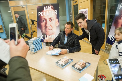 Ian Poulter signs books prior to his talk in the Great Hall