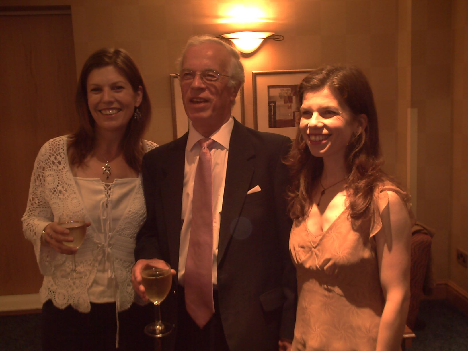 Peter Henson at his silver wedding anniversary, flanked by his two daughters, Mary and Sarah